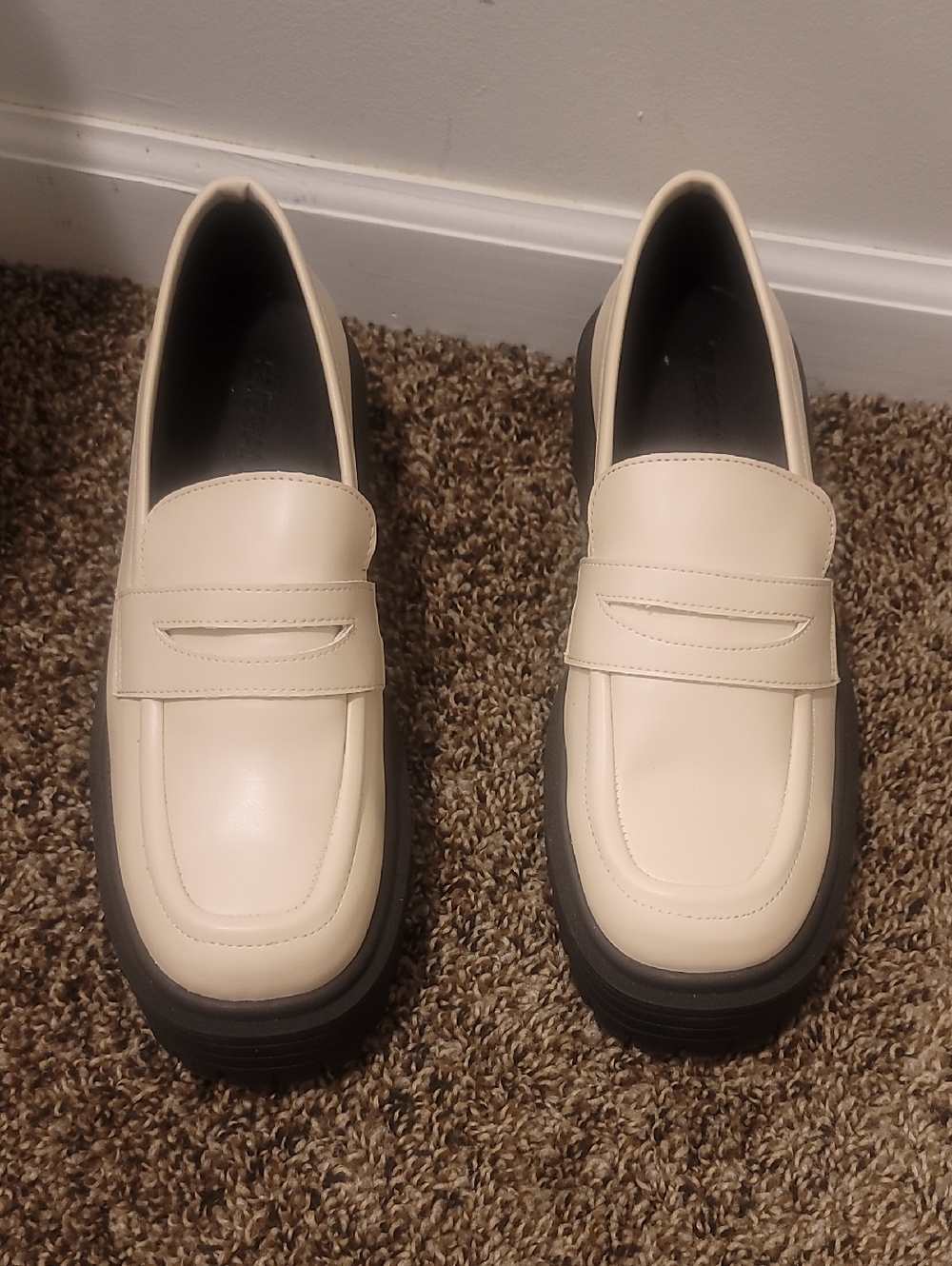 Cream Penny Loafers with Black Lug Sole — Sleek Women's Flats